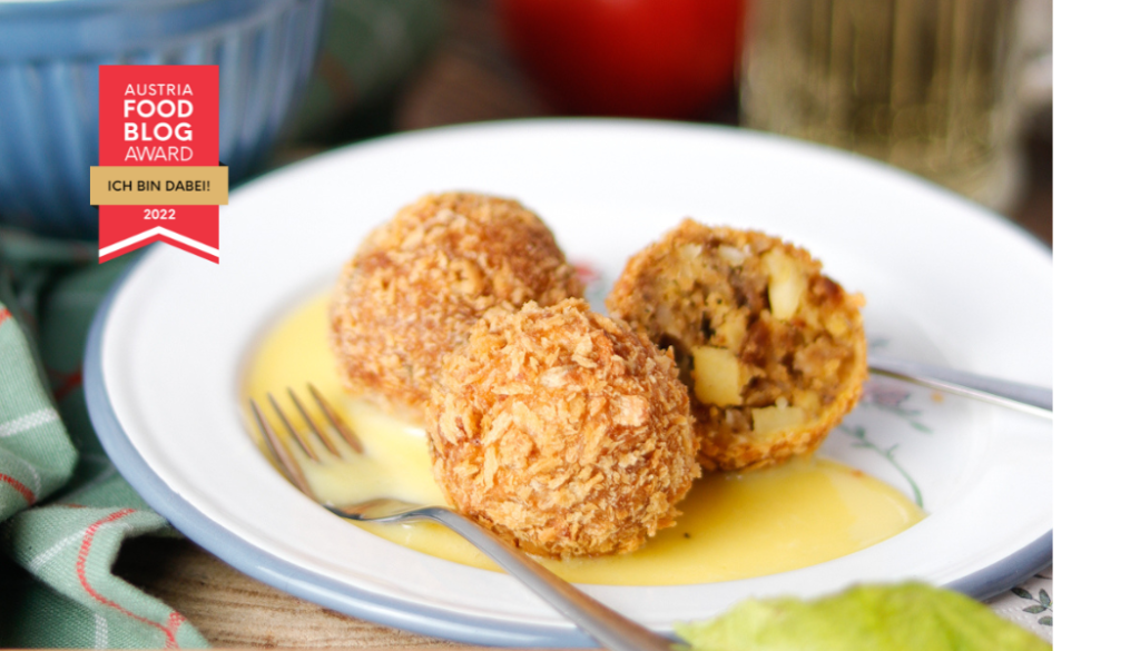 Apfelknödel in Mostsauce